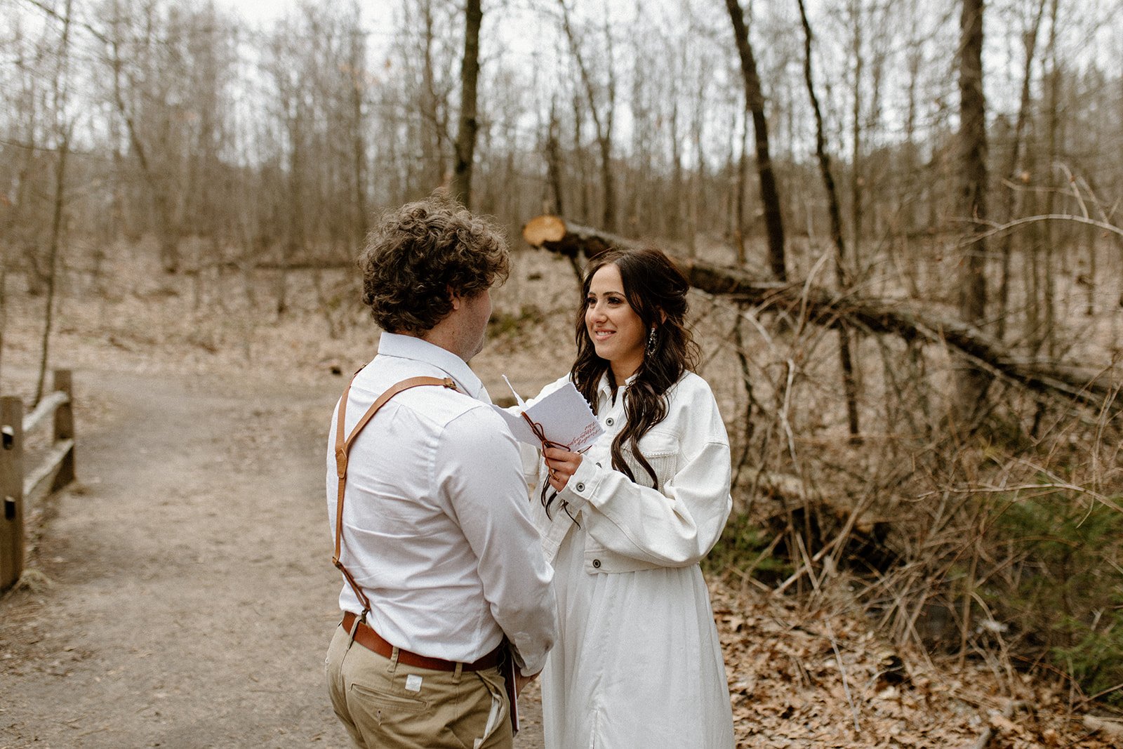 Vow exchange for adventure elopement on north country trail in michigan
