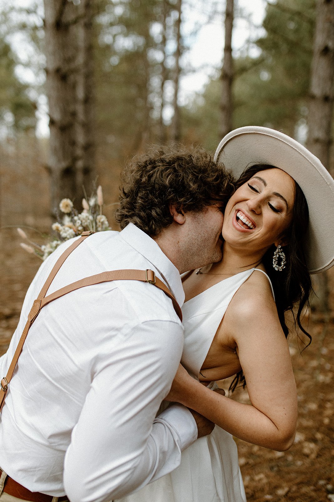 Neck kisses with Kennedy and Joey during their adventure elopement on North Country Trail