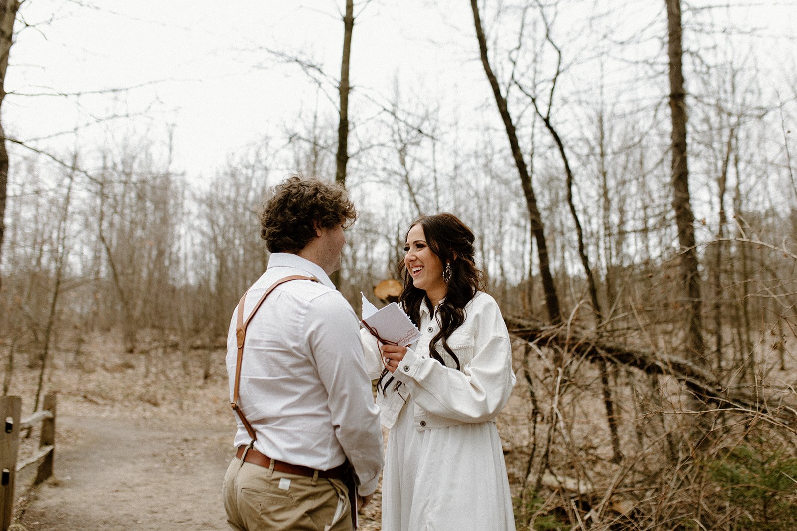 Kennedy and Joey exchanging vows for their adventure elopement on North Country Trail